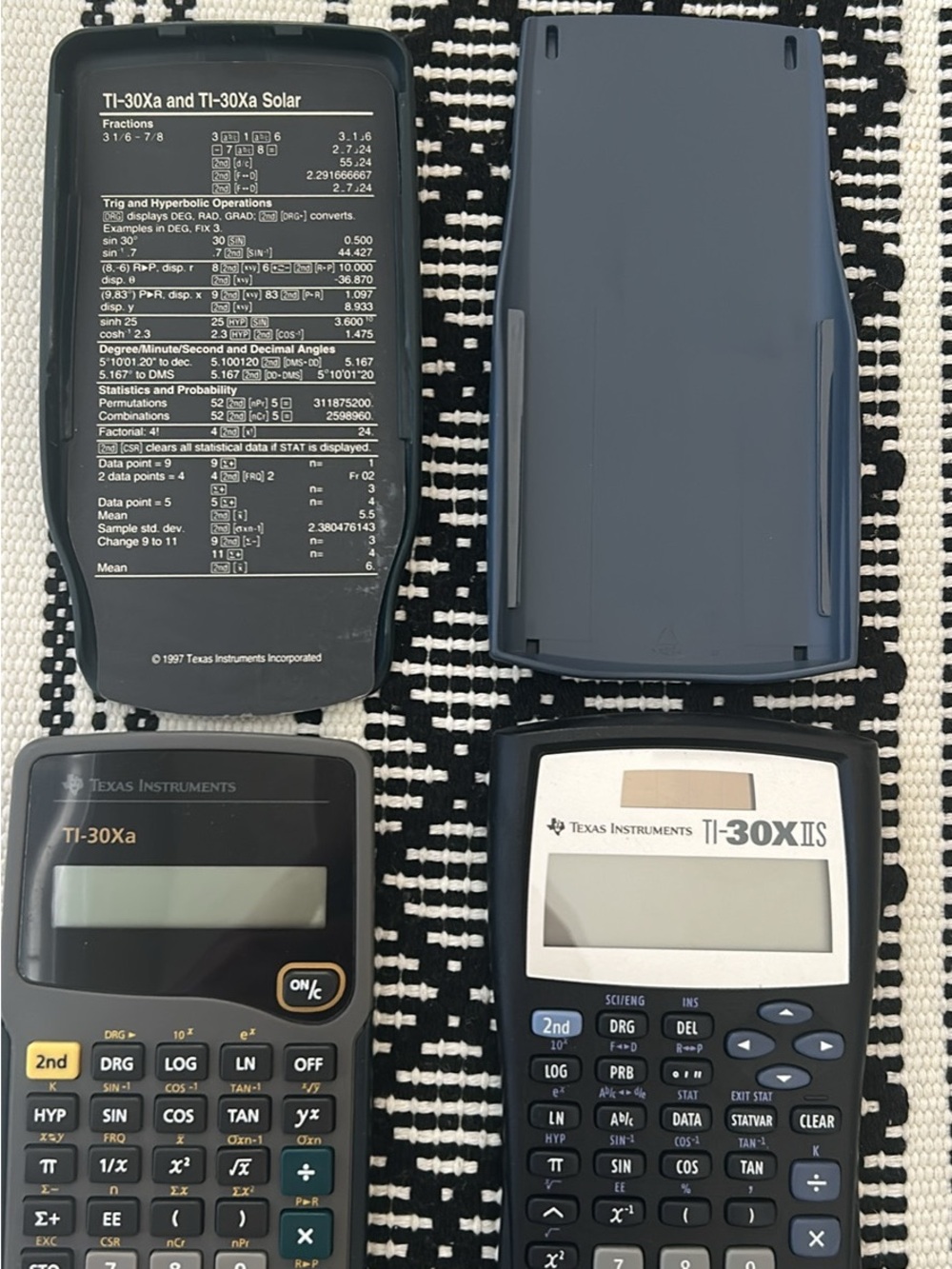 Texas Instruments Scientific Calculators in Black and Dark Gray